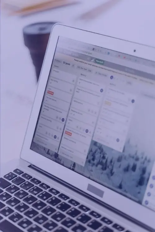 Laptop showing project dashboard — task and planning support for service providers